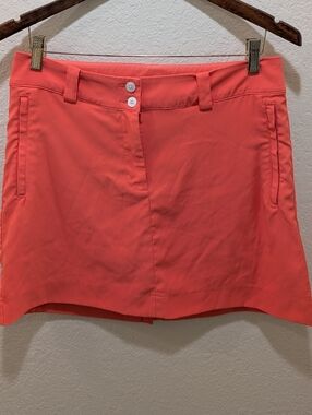 NikeGolf Dri-fit Athletic Skirt In A Coral Orange Color W/ Pockets. Size 6